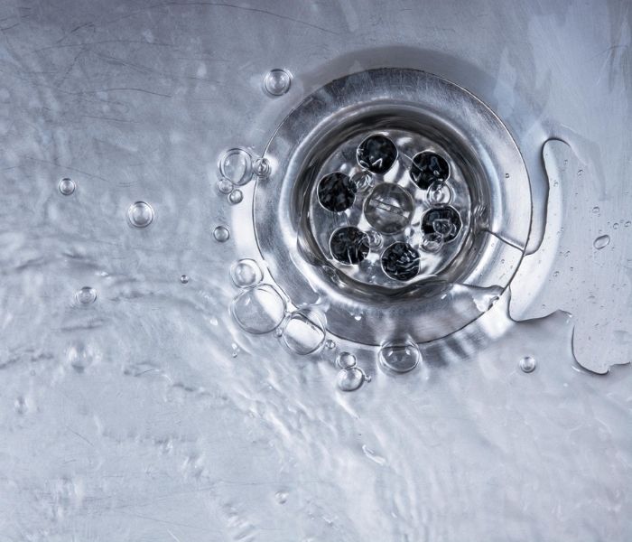 Water in sink with drain | Smelly Drain? Here's some home remedies you can try | Parralel Plumbing and Gas Blog